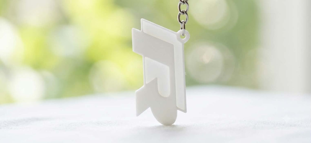 Auto-Symbol Schlüsselanhänger – Stilisiertes Design